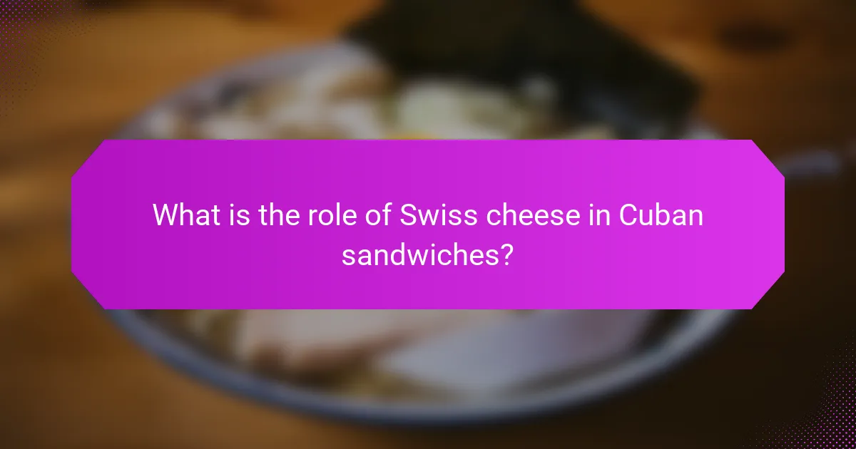 What is the role of Swiss cheese in Cuban sandwiches?